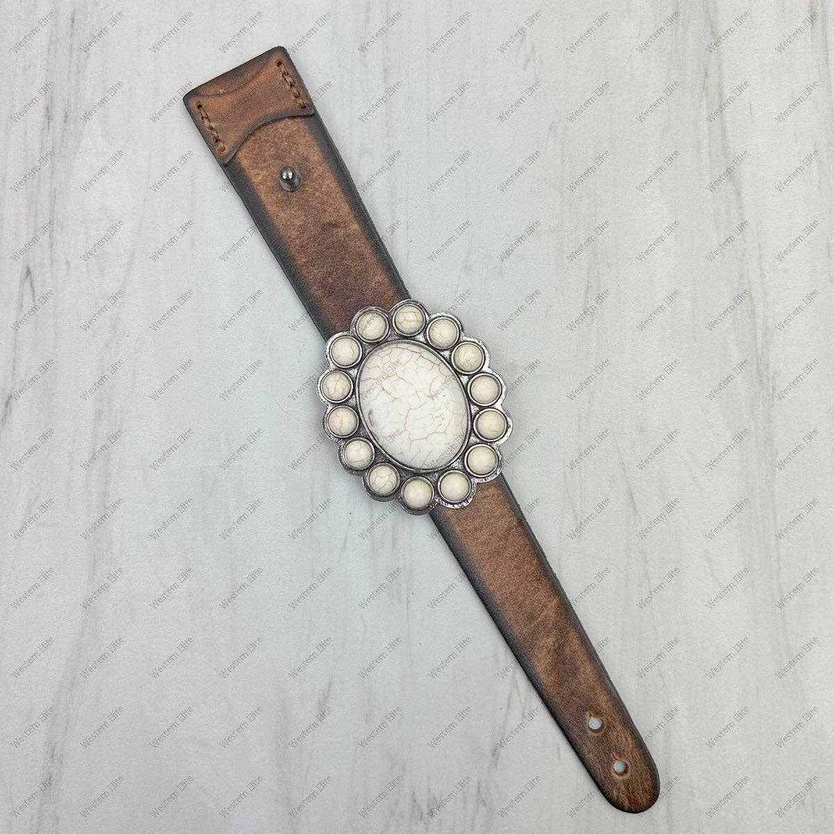 Brown leather with large turquoise or white stone oval concho bracelet