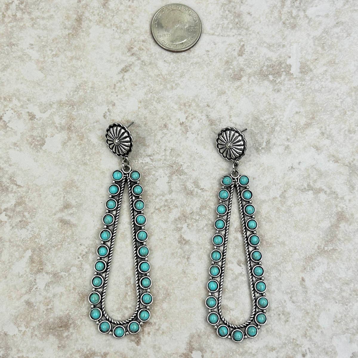 Silver sunburst concho with blue turquoise stone long teardrop Earring