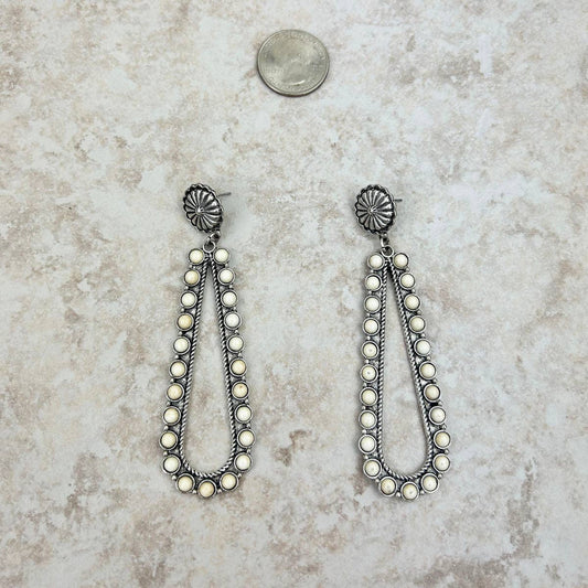 Silver sunburst concho with white stone long teardrop Earring