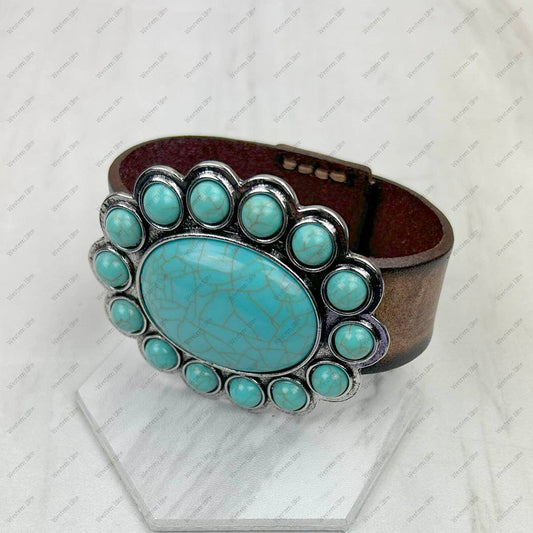 Brown leather with large turquoise or white stone oval concho bracelet