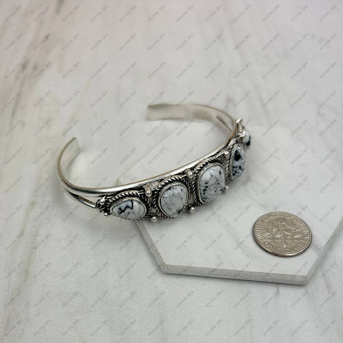 Silver metal with white turquoise stone bangle
